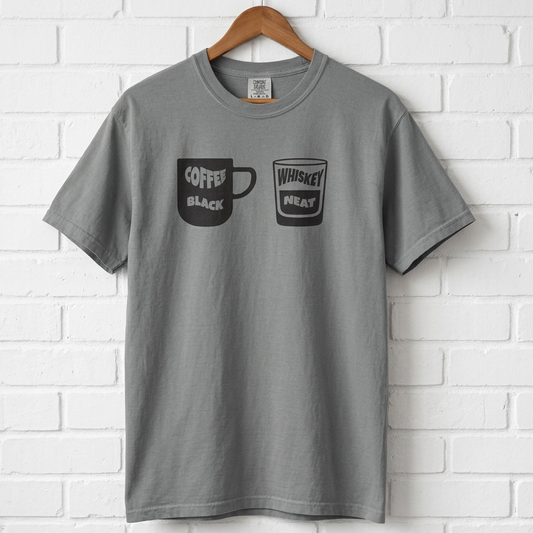 Gray t-shirt with coffee and whiskey graphic on a white brick wall background