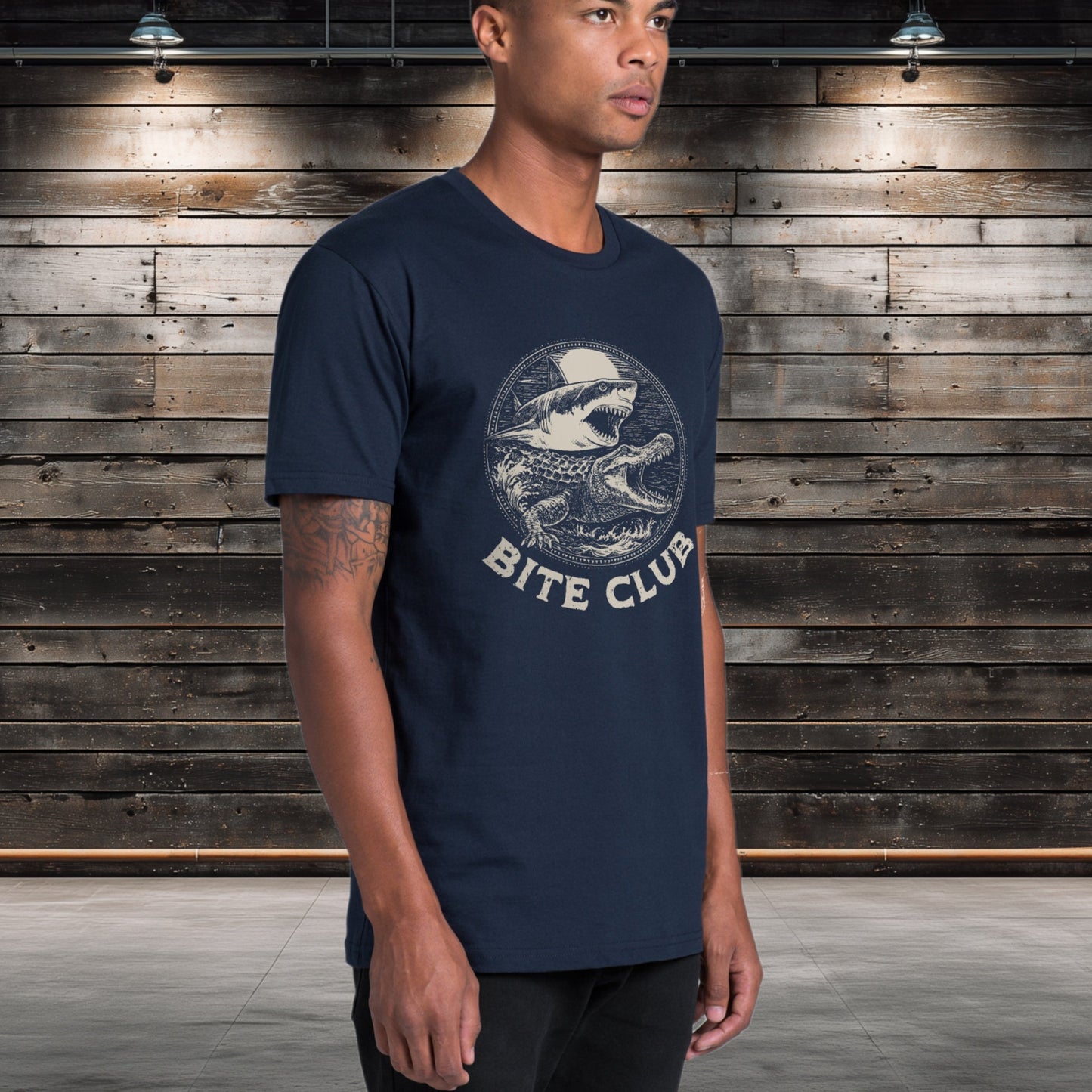 Croc and Shark graphic tee with the words " Bite Club " printed below the graphic