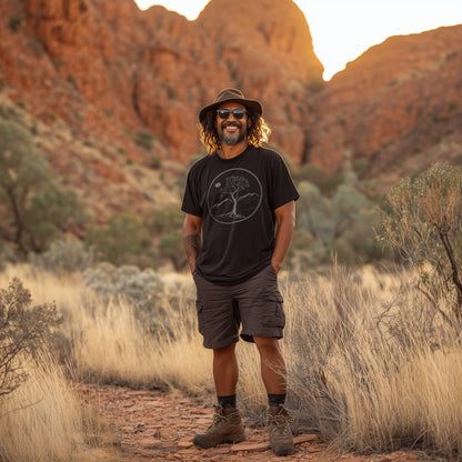 GhostGum mountain tee in black worn by a man in the outback