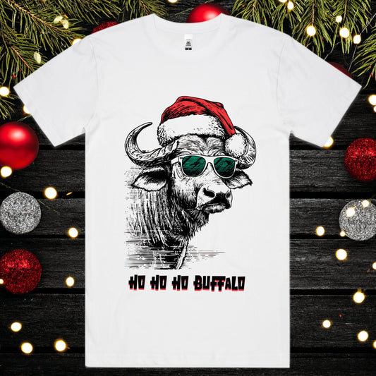 White t-shirt with a buffalo wearing a Santa hat and sunglasses design, surrounded by Christmas decorations.