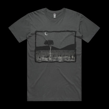 Tshirt with Bold Graphic of Larapinta Gum Tree against a background of the West MacDonnell ranges