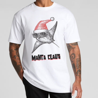 Person wearing a white t-shirt with a graphic design of a Manta Ray Wearing a Christmas Hat