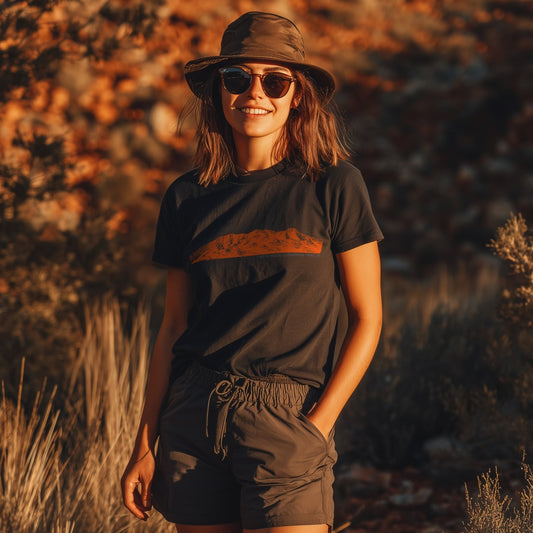 Mt Sonder Larapinta Tshirt worn by a woman hiking in Northern Territory in the beautiful central australian bush scene.