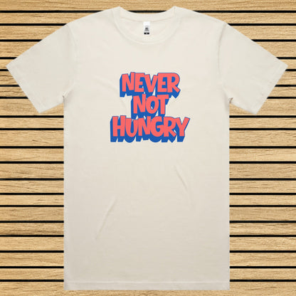 Ecru t-shirt with 'NEVER NOT HUNGRY' text in blue and red on a wooden slat background