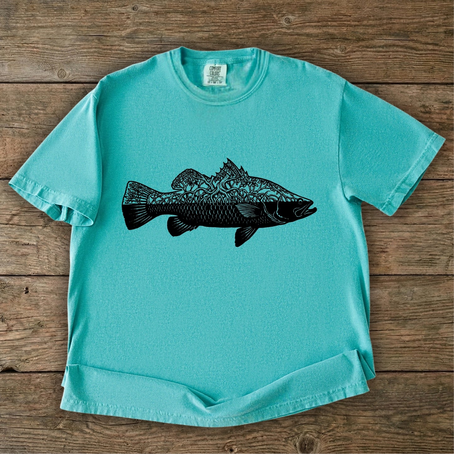 Seafoam t-shirt with black barra mangrove design 