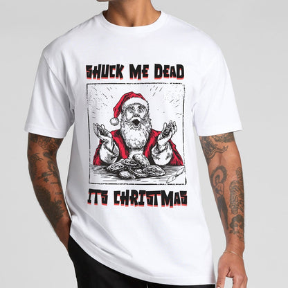 Person wearing a white t-shirt with a Christmas graphic design of santa shucking oysters saying shuck me dead its christmas text on a plain background