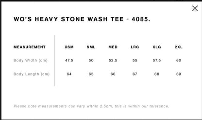 Measurement chart for a women's heavy stone wash tee with size options and dimensions.