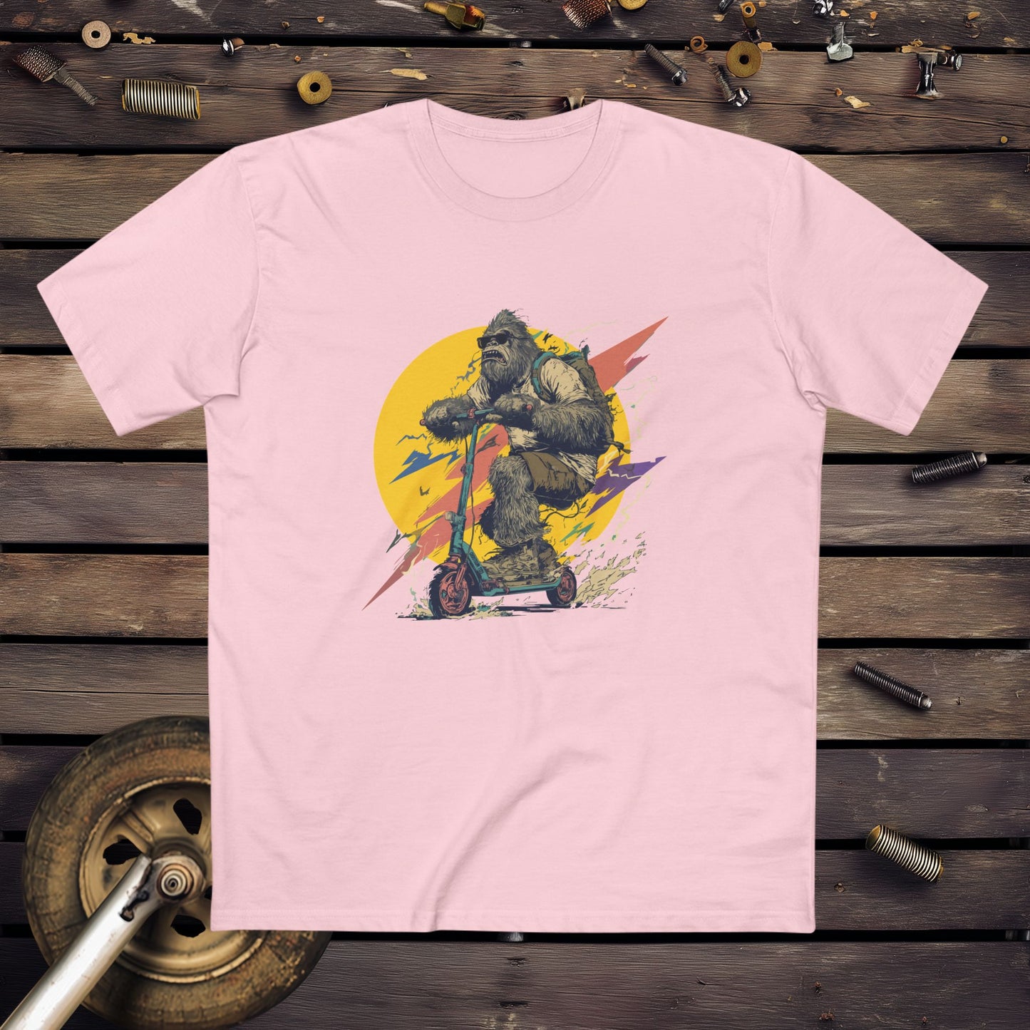 Yowie Bigfoot on a scooter graphic design - Pink t-shirt