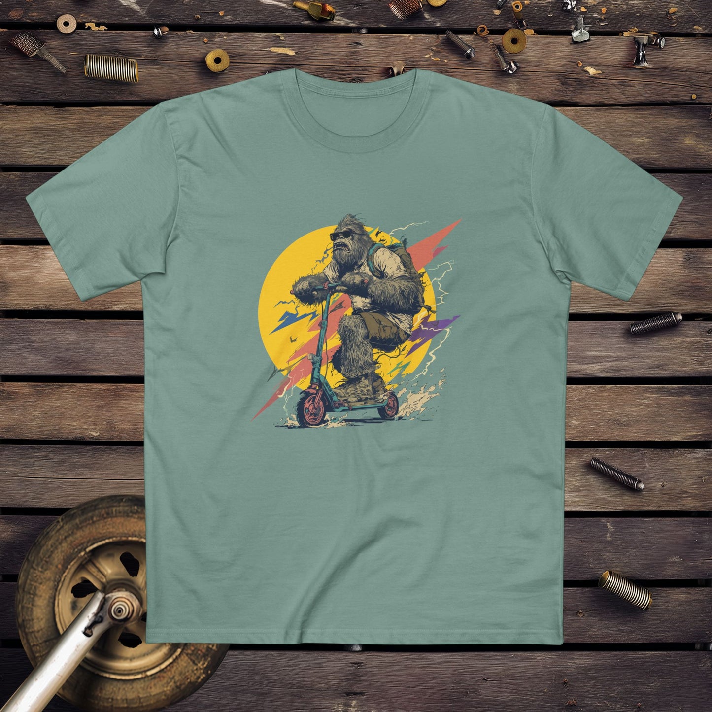 Yowie Bigfoot on a scooter graphic design - Sage t-shirt 