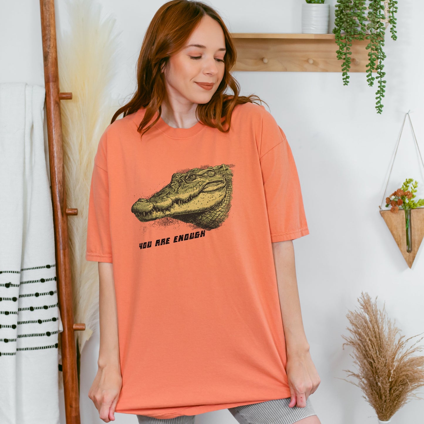 You Are Enough - Croc TShirt in terracotta colour modelled by a woman