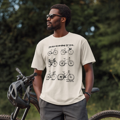 Model wearing “It’s Not Hoarding If It’s Bikes” beige T-shirt by GhostGum Tees, a funny cycling graphic tee featuring six vintage-style bikes. Great gift for cyclists and bike lovers