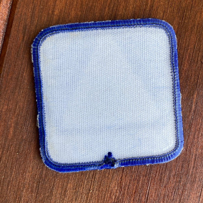 Reverse sticky side of trail patch